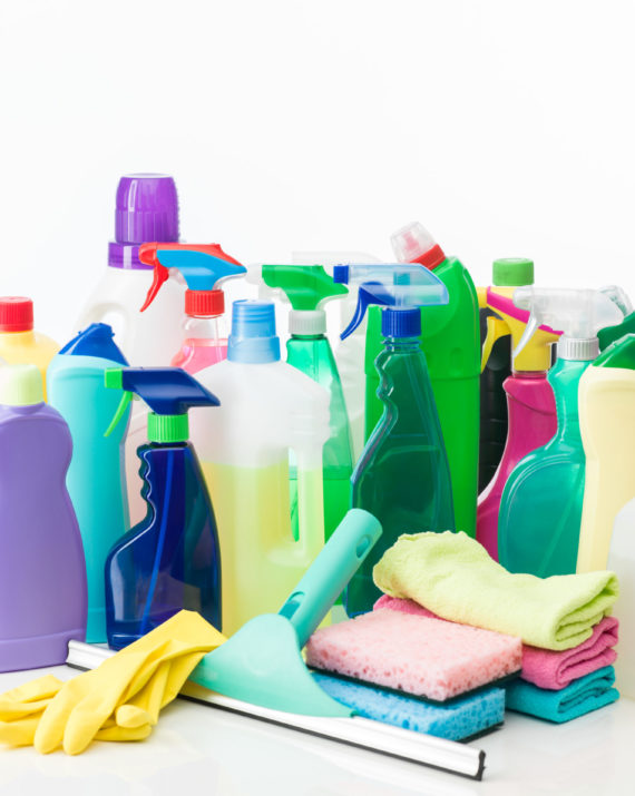 group of cleaning products and equipment on white background